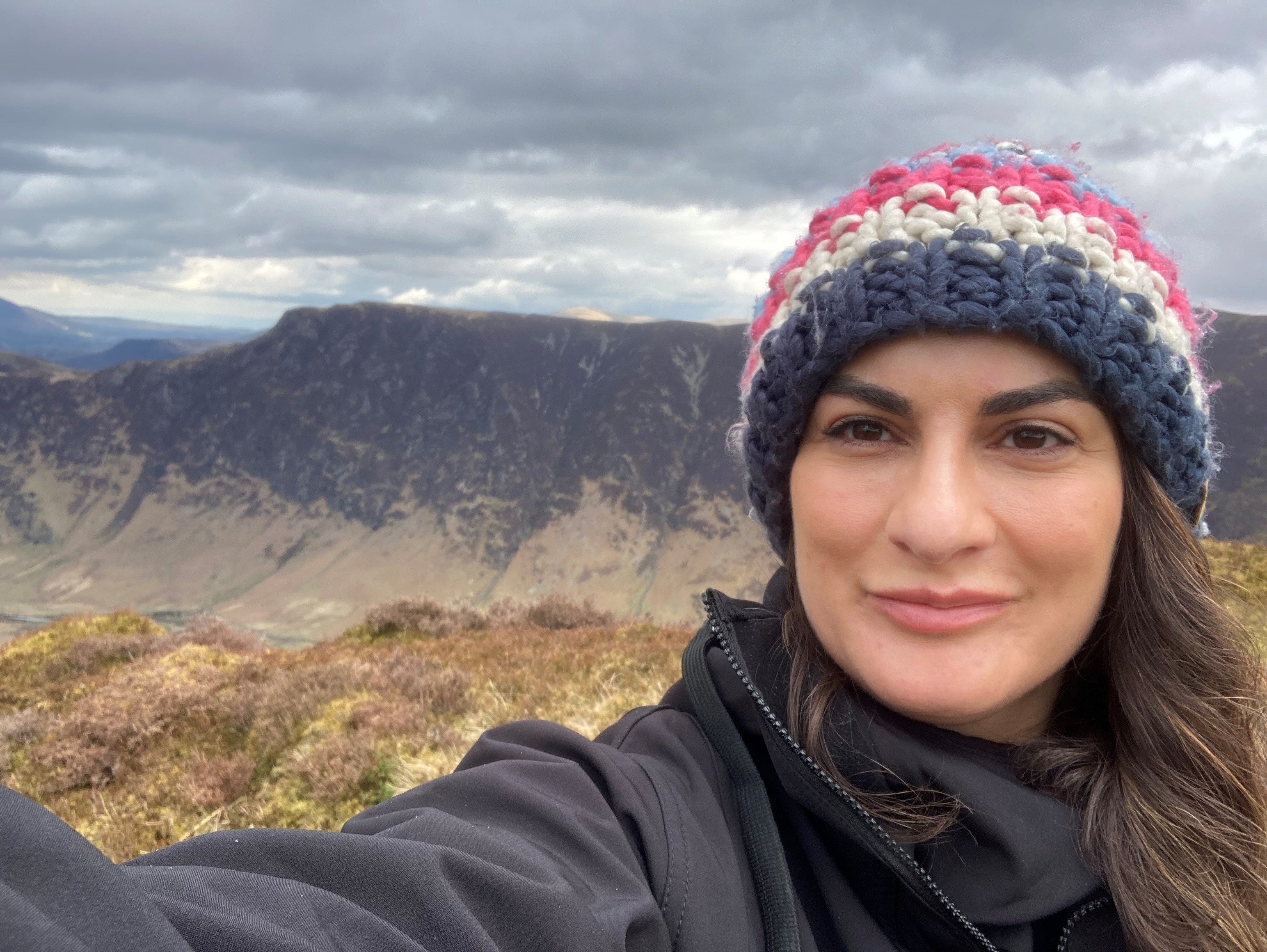Anooshka Rawden headshot with Lake District in the background
