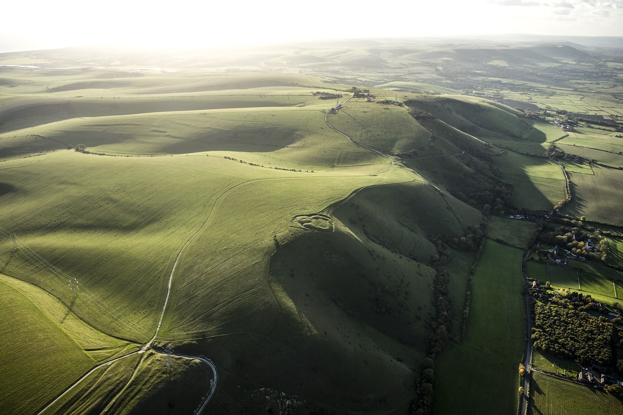 A motte and bailey castle on Edburton Hill looking west to Truleigh Hill, South Downs Way