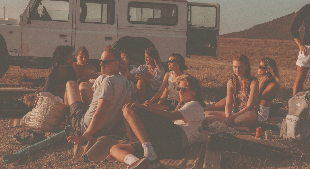 Friends enjoying time together watching sunset