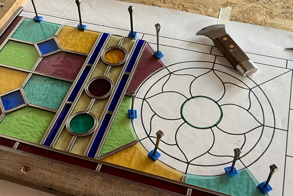 Traditional handcrafted stained glass panel in a front door, adding colour and character to a home