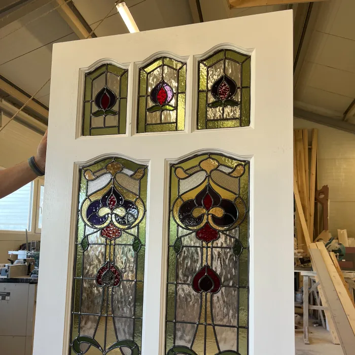 Traditional Victorian style front door with stained glass