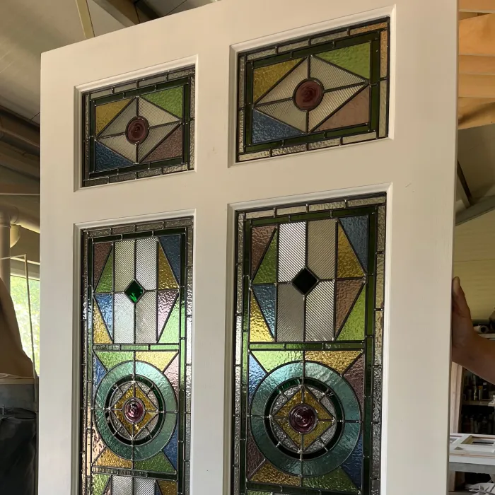 Geometric stained glass design in an Edwardian front door