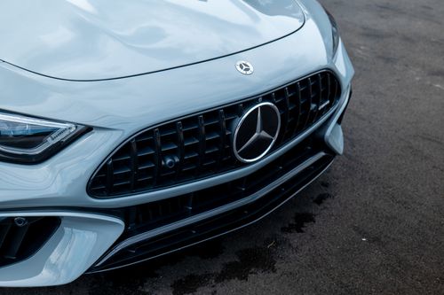 The grille of a Mercedes AMG SL, finished in gloss black vinyl, advertising our chrome delete service.