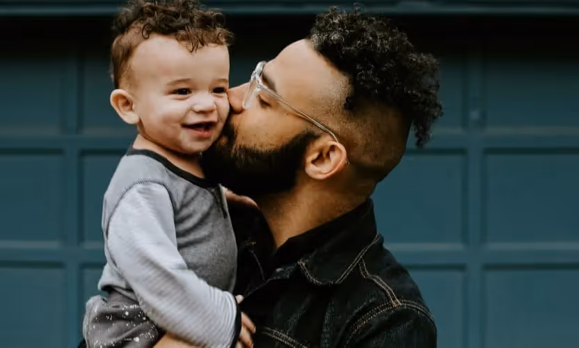 A man holding a baby