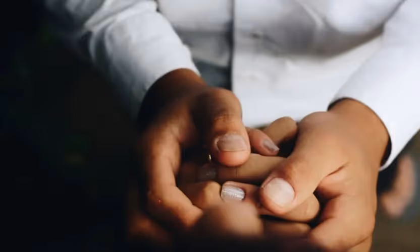 Hands holding