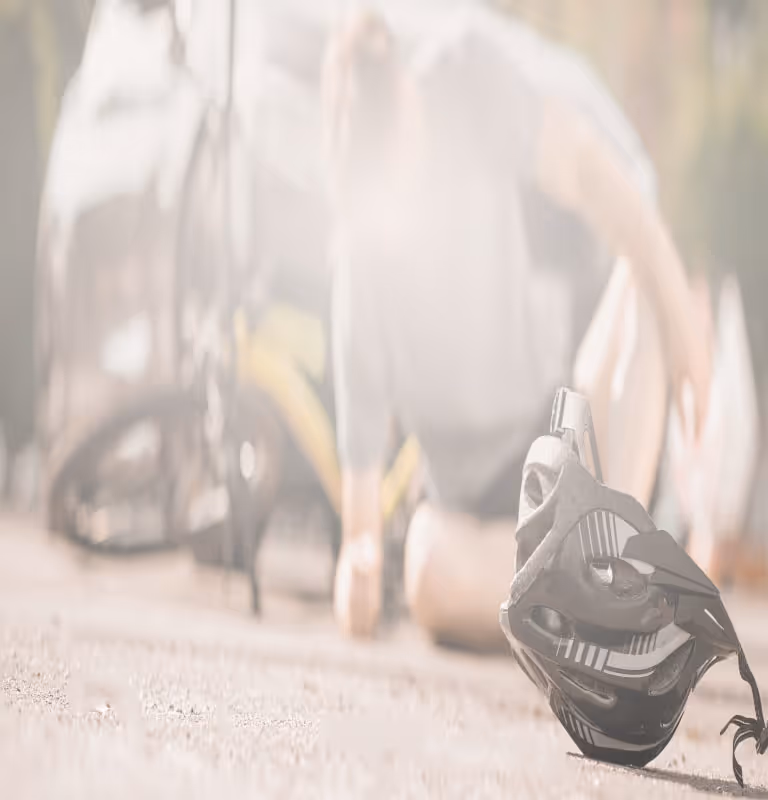 a men sitting on the road