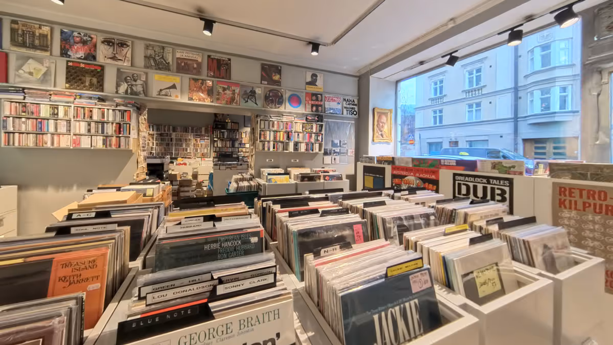 Virtual tour view of Eronen record store interior in Helsinki, Finland, showing vinyl record displays, browsing sections, and store layout captured in 360-degree photography
