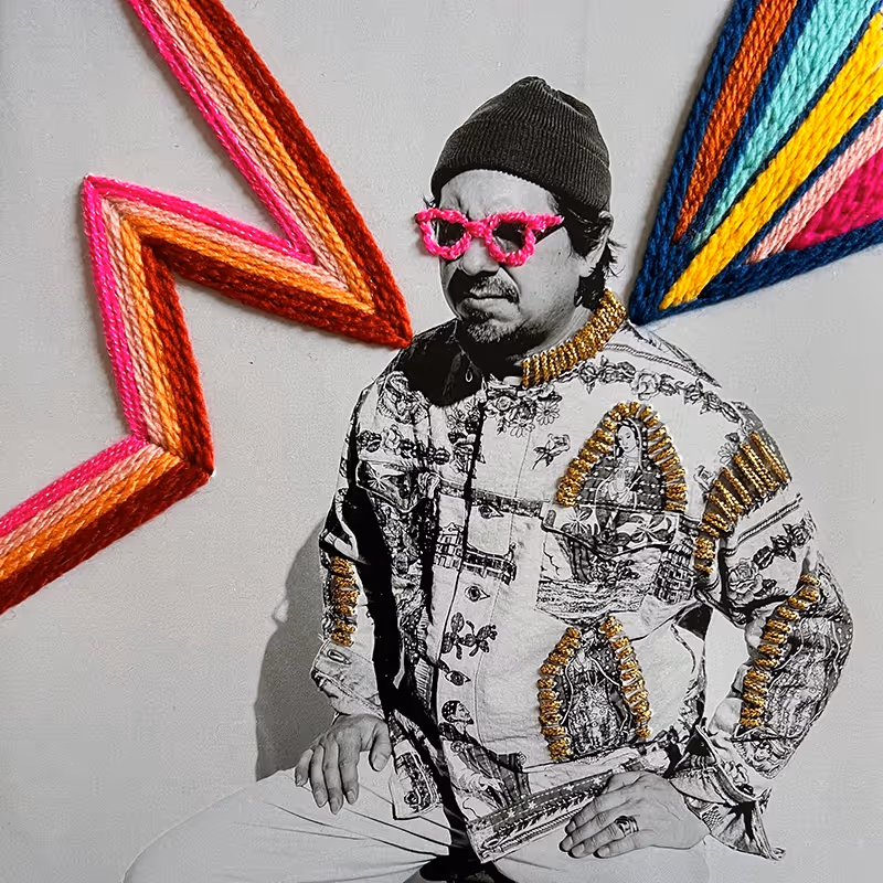 Photo of Adrian Quesada, image source Apple Music