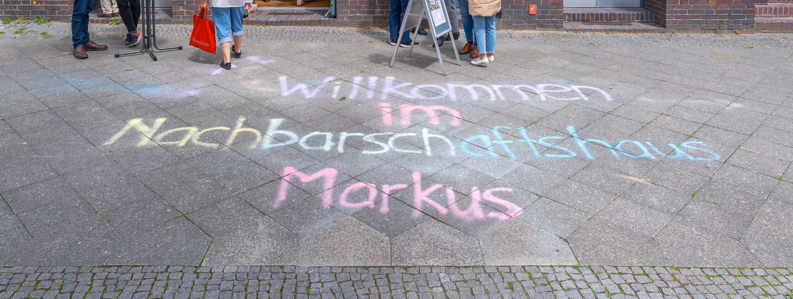 Das Nachbarschaftshaus Markus mit Kreideschrift