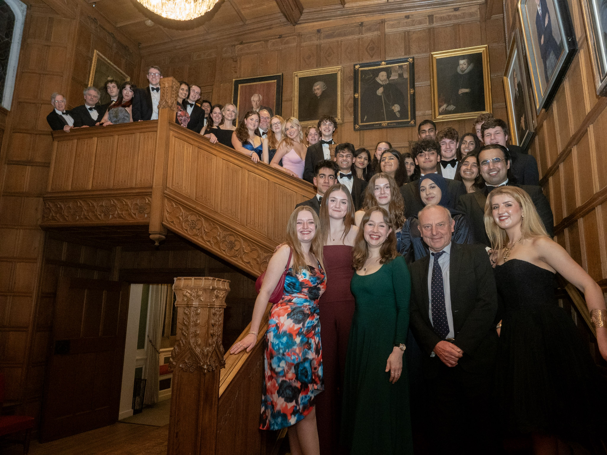 Members of MedSoc pose on the stairs at St John's College