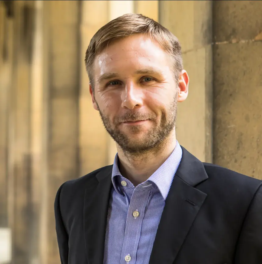 Professor Tuomas Knowles in New Court Cloisters, St John's College