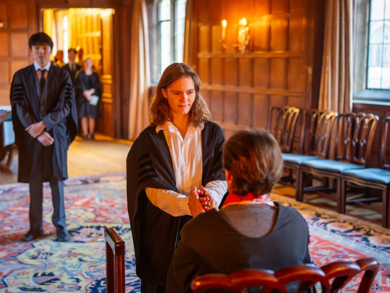 An image of a student standing in the Combination room
