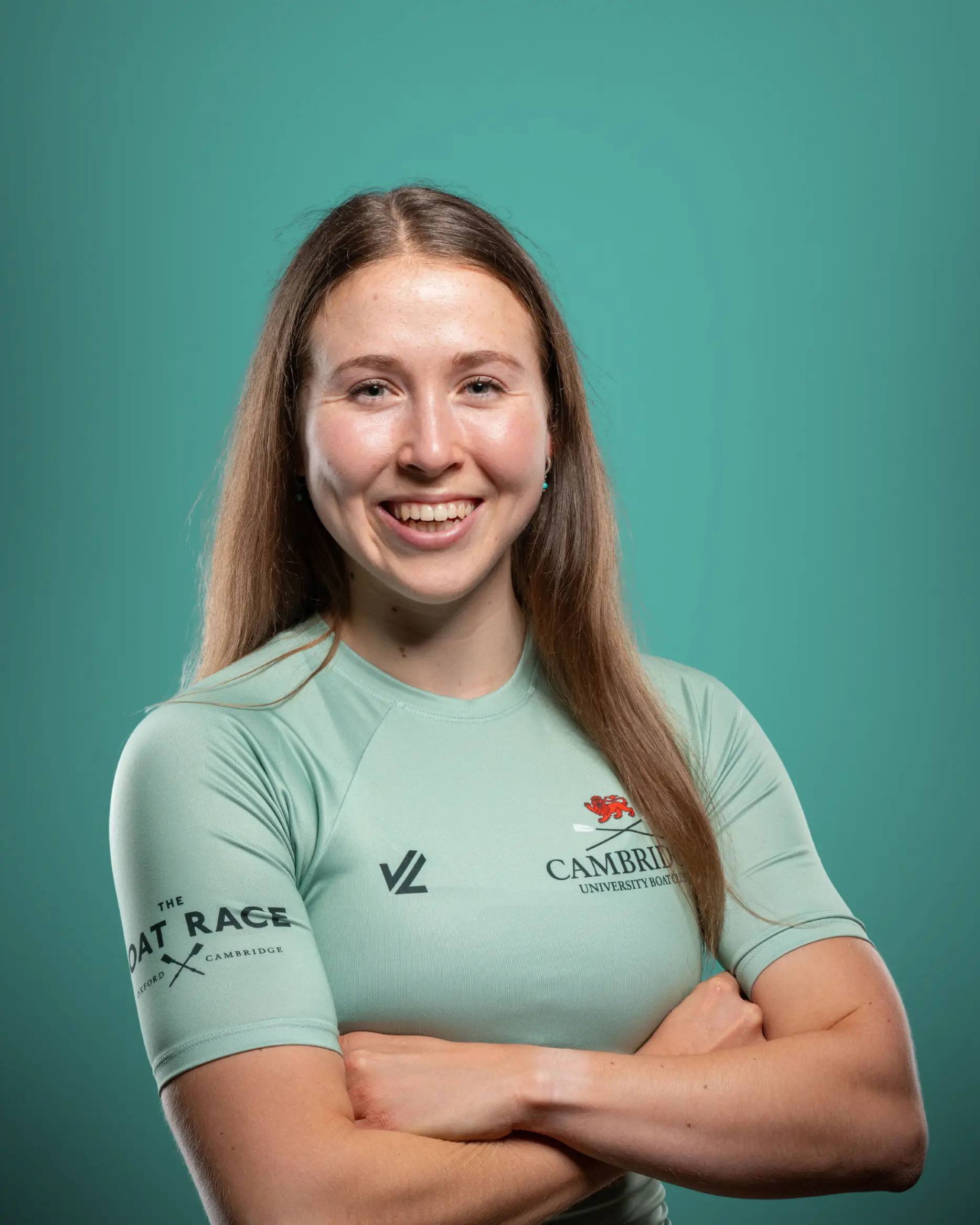 Gemma King smiling at the camera wearing Cambridge Rowing kit