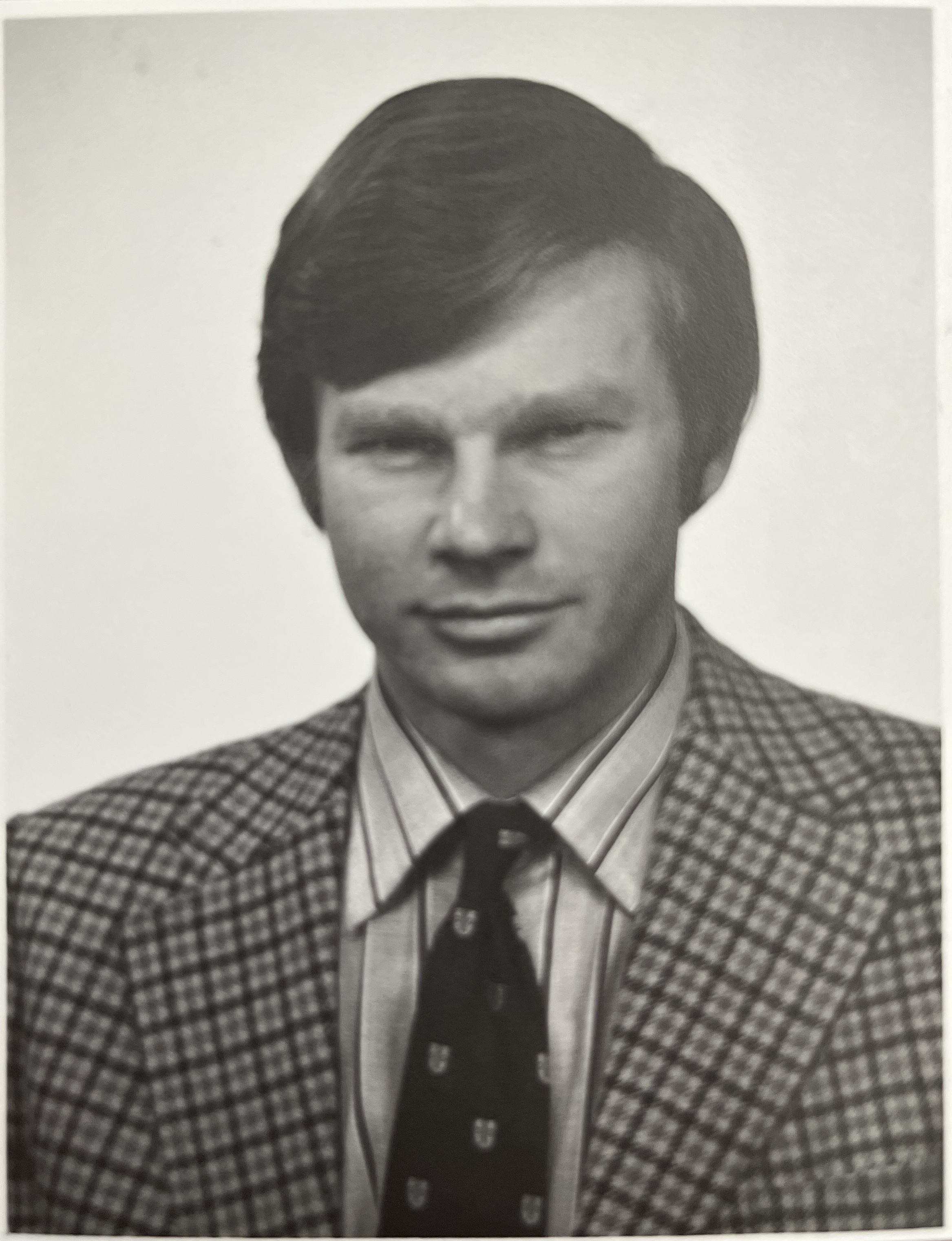 Black and white portrait photo of Dr Richard ‘Dick’ Ernest McConnel