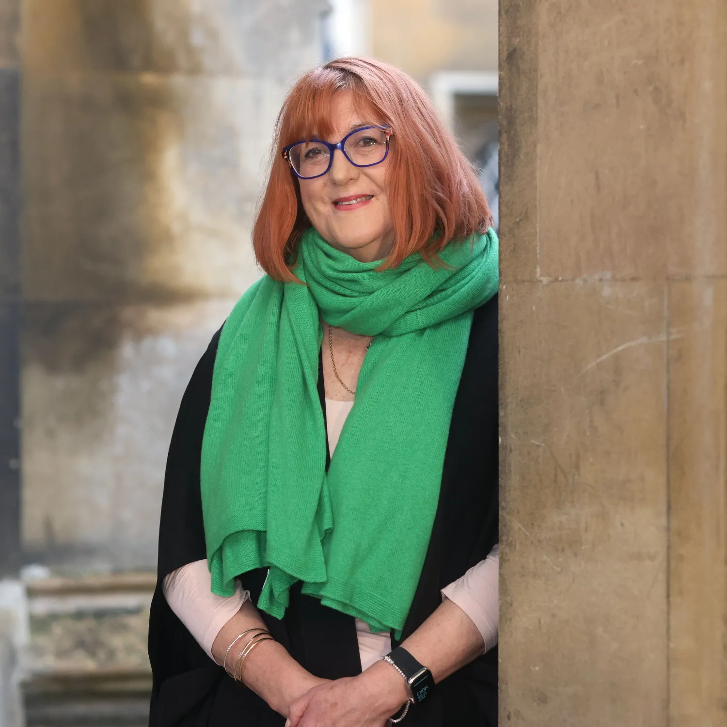 A portrait of Dr Morag Morrison-Helme in The Cloisters of St John's College, Cambridge