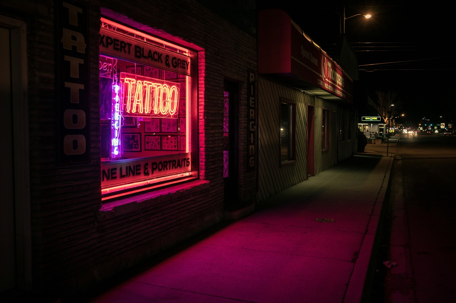 Tattoo shop with neon signages