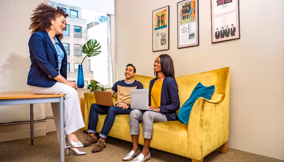 People in a meeting seating on the couch