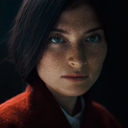 Midjourney prompt engineering for realistic character portraits, showcasing detailed facial features and expressive eyes.