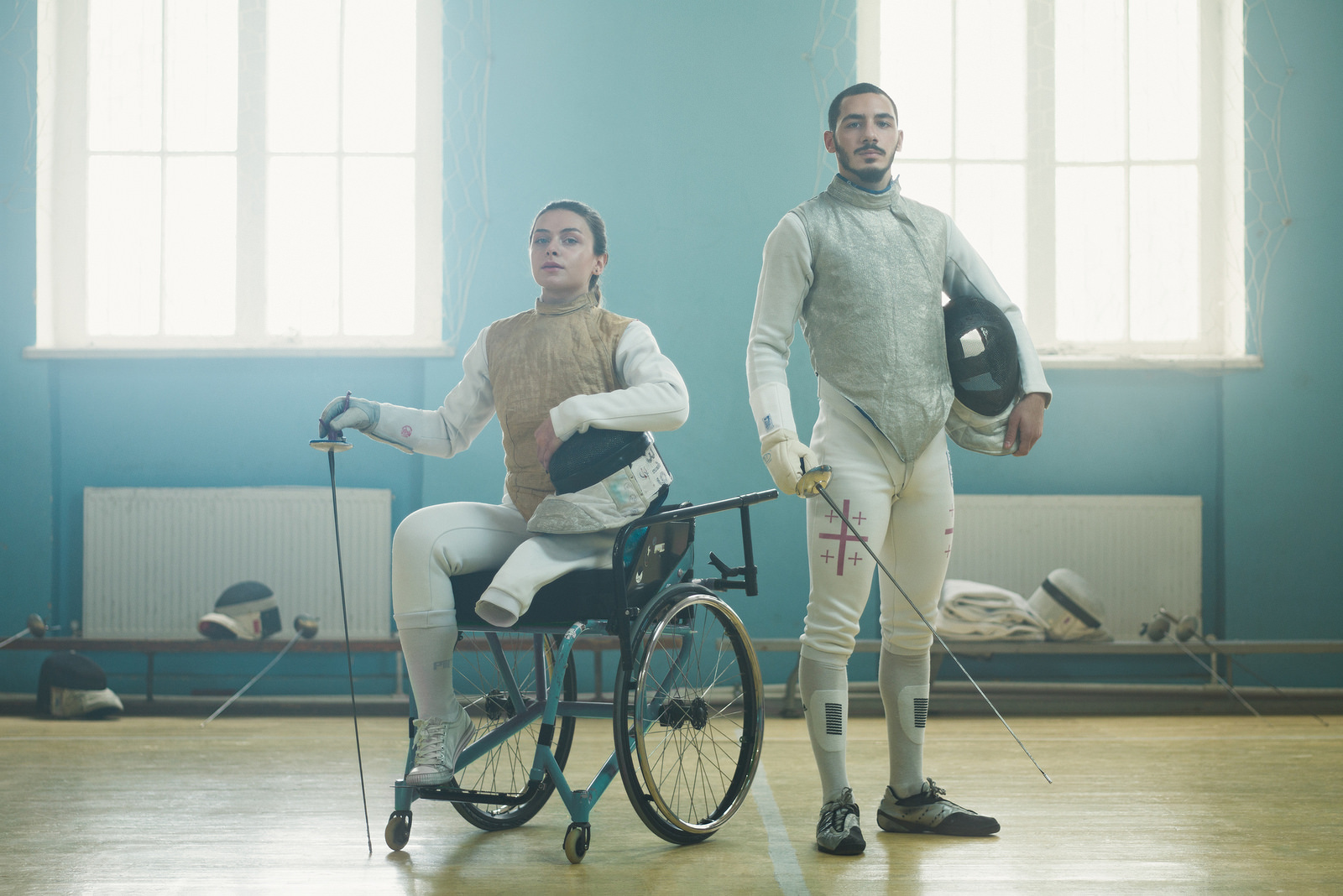 Midjourney prompt showcasing adaptive fencing athletes in training environment, highlighting techniques, equipment, and inclusive sports representation.