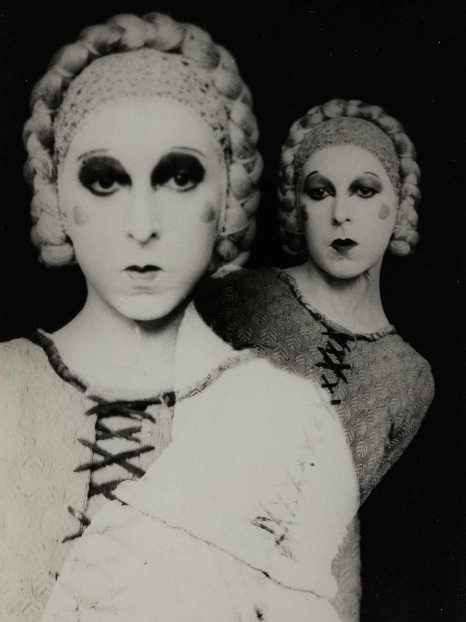 Self-portrait by Claude Cahun, 1929, showcasing surrealism, gender identity, Midjourney prompt engineering, vintage monochrome style.