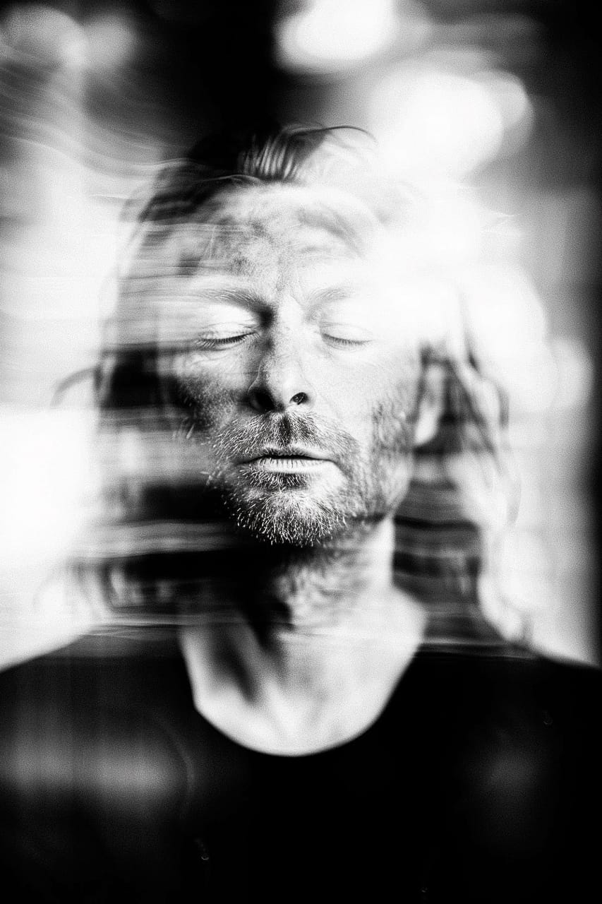 Midjourney prompt showcasing style referencing with blurred portrait effect, emphasizing creative photography techniques and influence control.