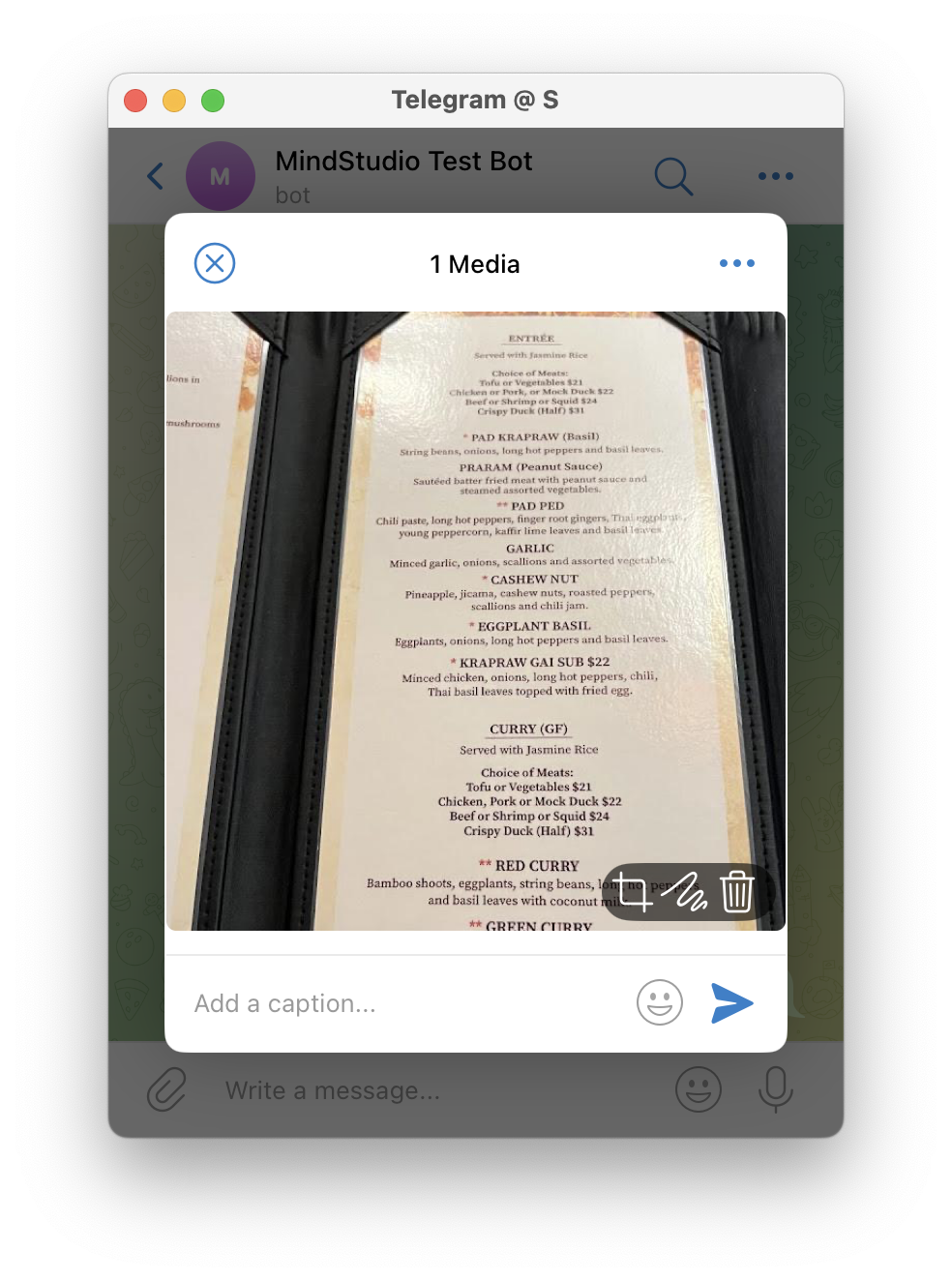 Send the restaurant menu test image to Telegram from a mobile device