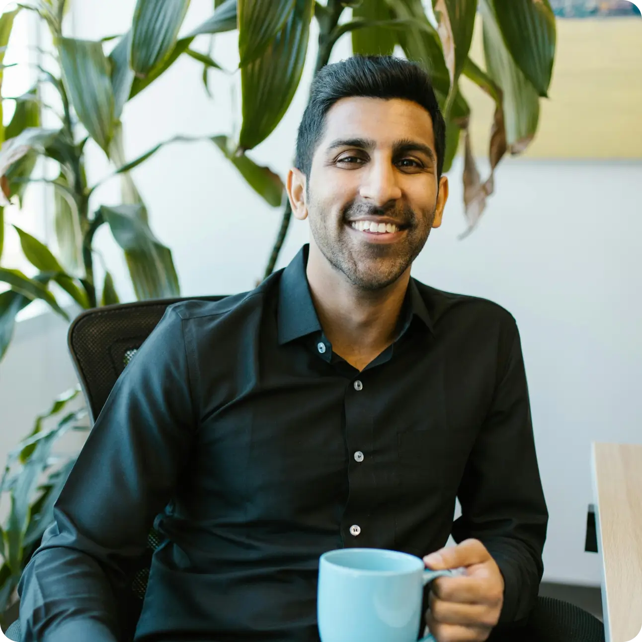 Person Holding Cup