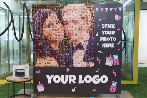 Physical photo mosaic: guests place their printed photo tiles on the wall themselves
