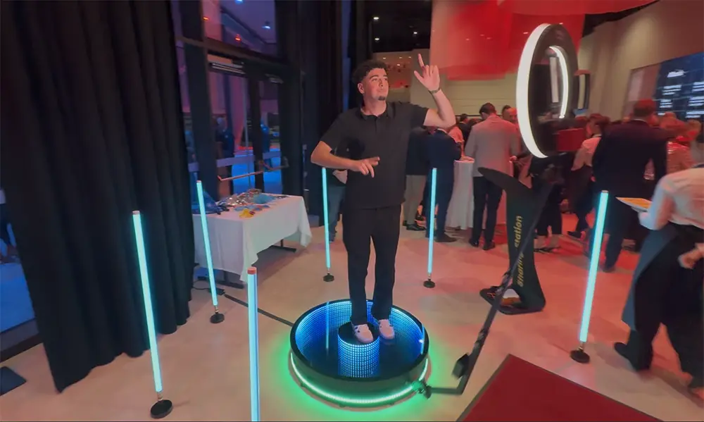 Guest posing on the platform of the 360 degree ground spinner
