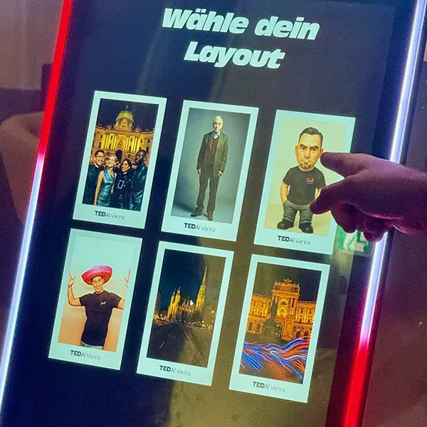 Guest choosing from six AI motifs on the AI Magic Mirror display