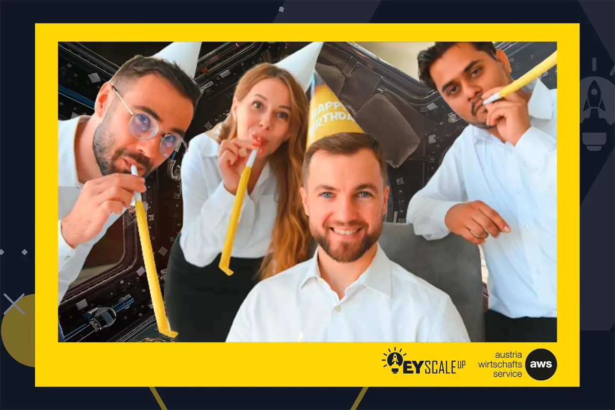 Branded print with four celebrating guests in a yellow frame