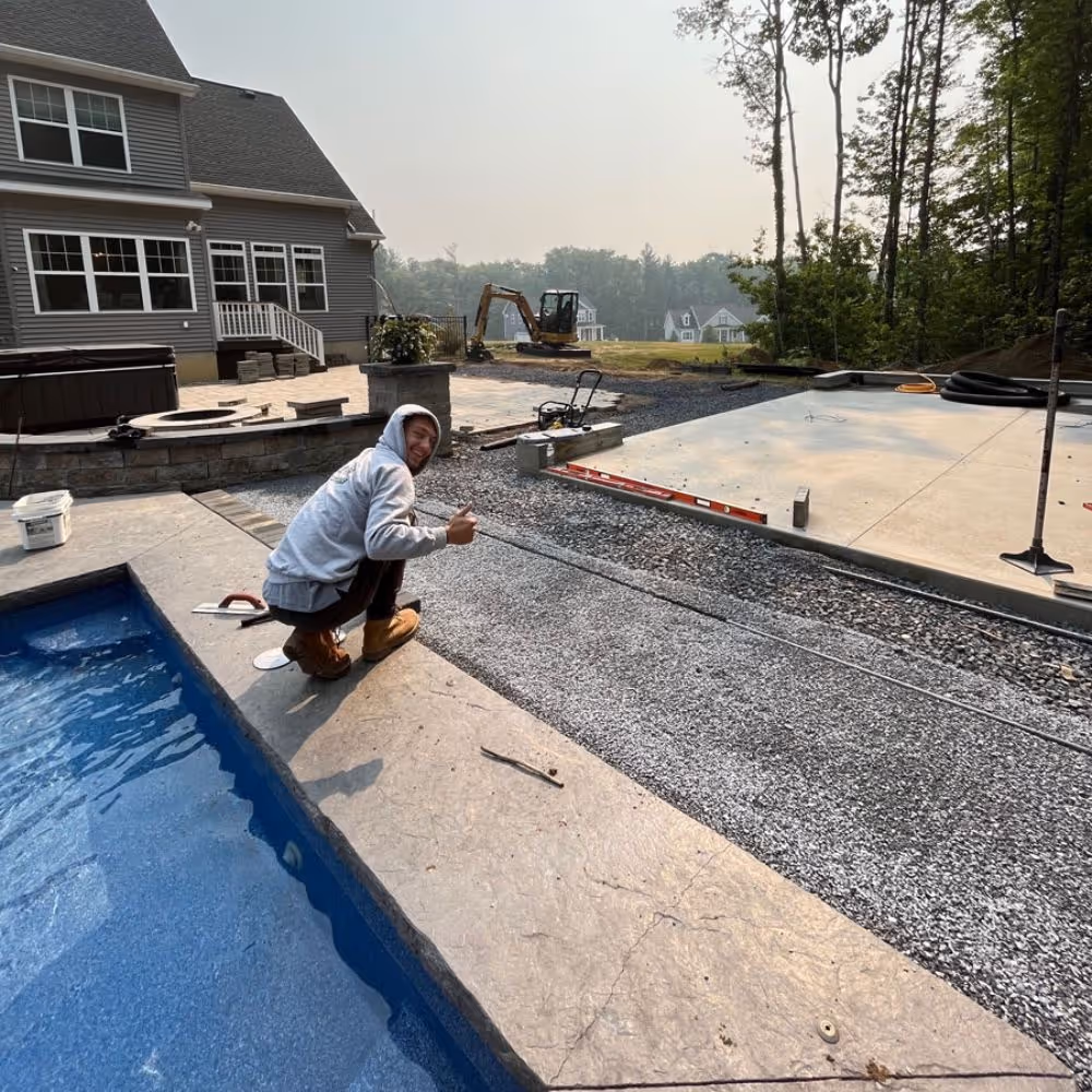 Man installing pavers
