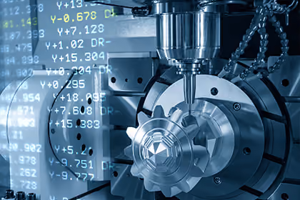 Close-up of CNC milling machine machining a metal gear with overlaid numerical data.