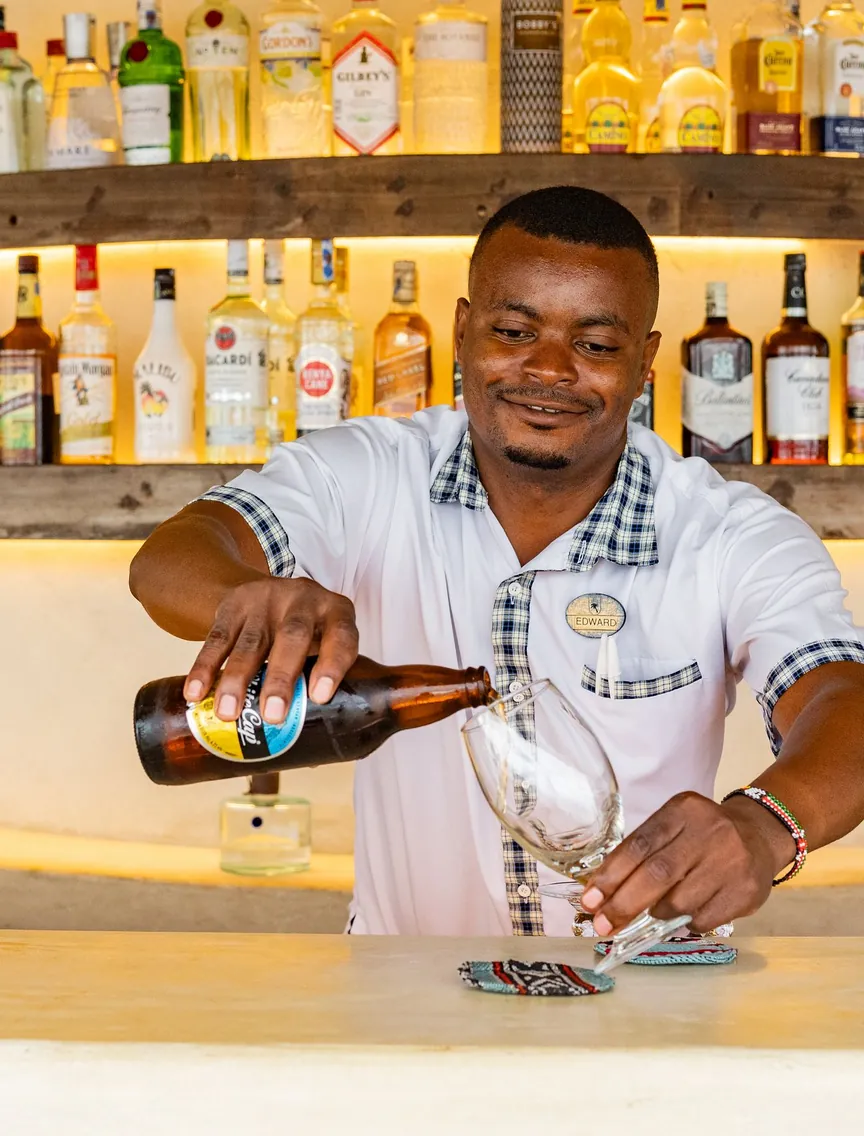 Bartender mixing a cocktail at the bar