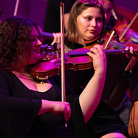 Georgia and her friend, Mel, playing in the Rock Symphonic Orchestra.