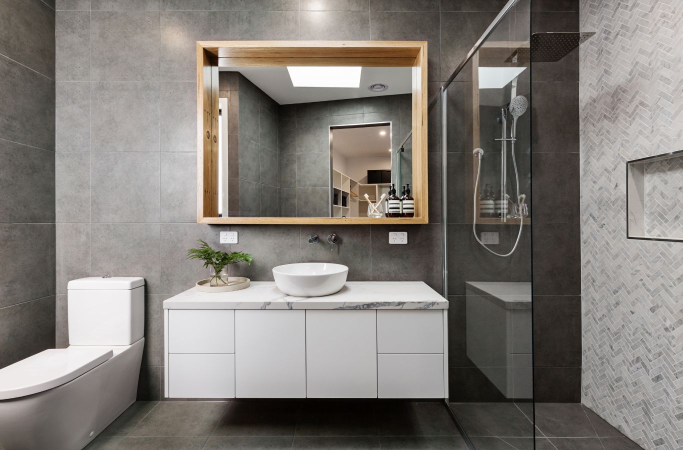 A Sapphire Home Cleaning specialist scrubbing a bathroom in a Chicago, IL Airbnb, showcasing attention to hygiene and detail in Airbnb cleaning services. Airbnb Cleaning near me.