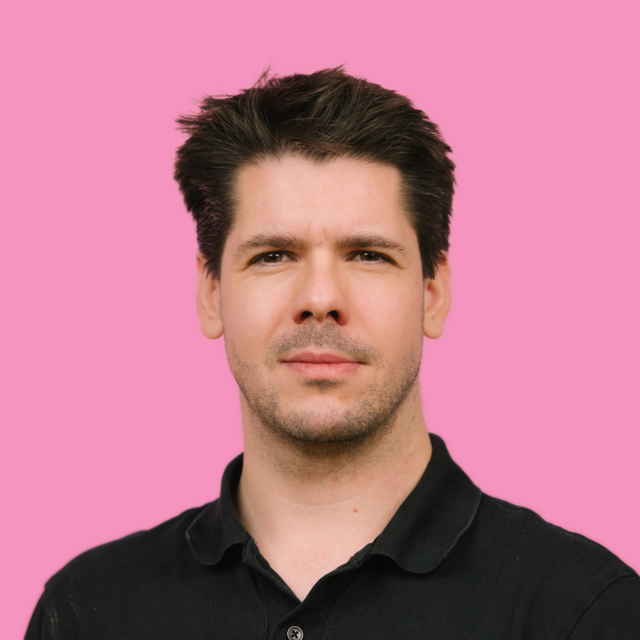 Portrait photograph of author Alex Pugh