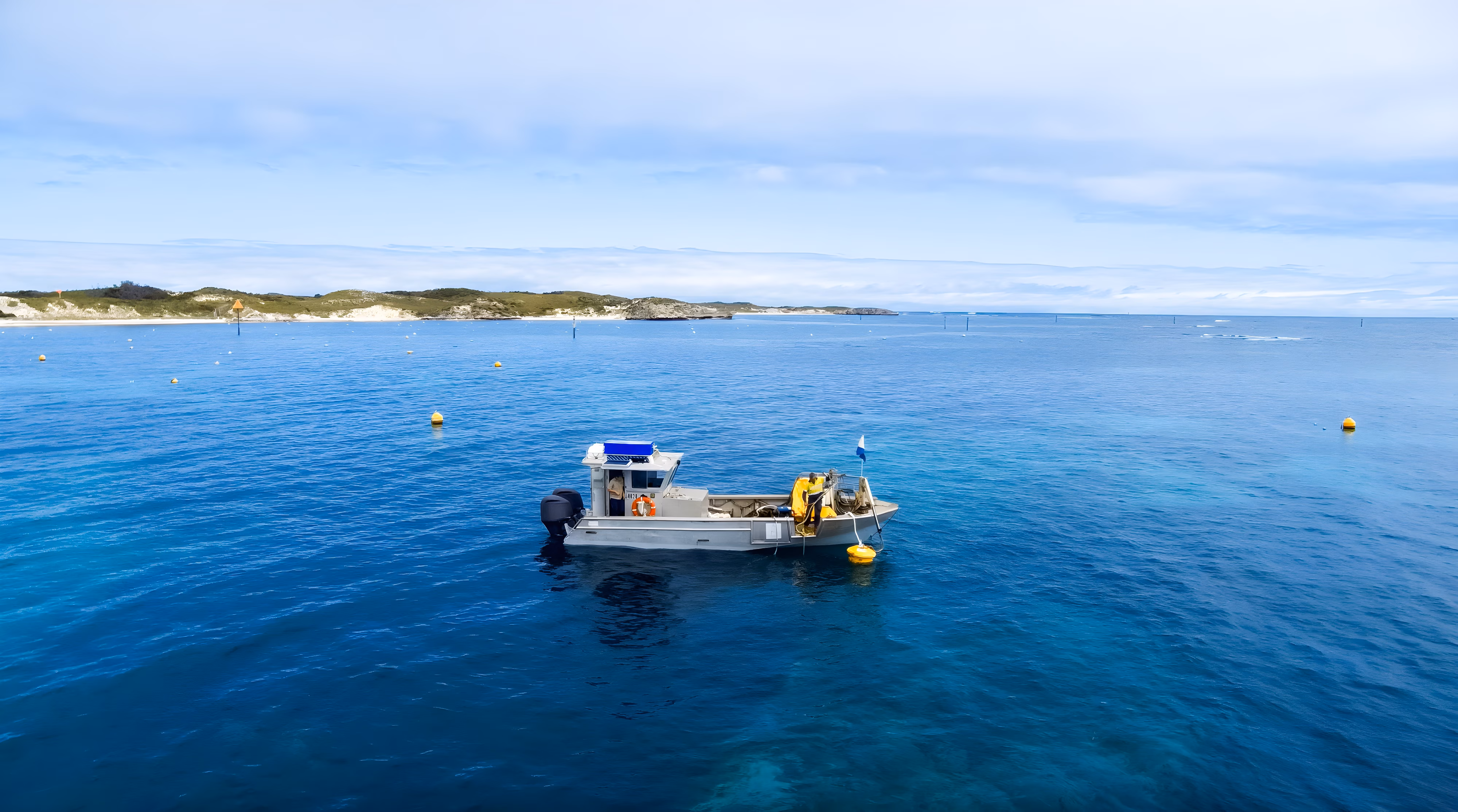 Commercial workboat deploying a mooring buoy at Rottnest Island