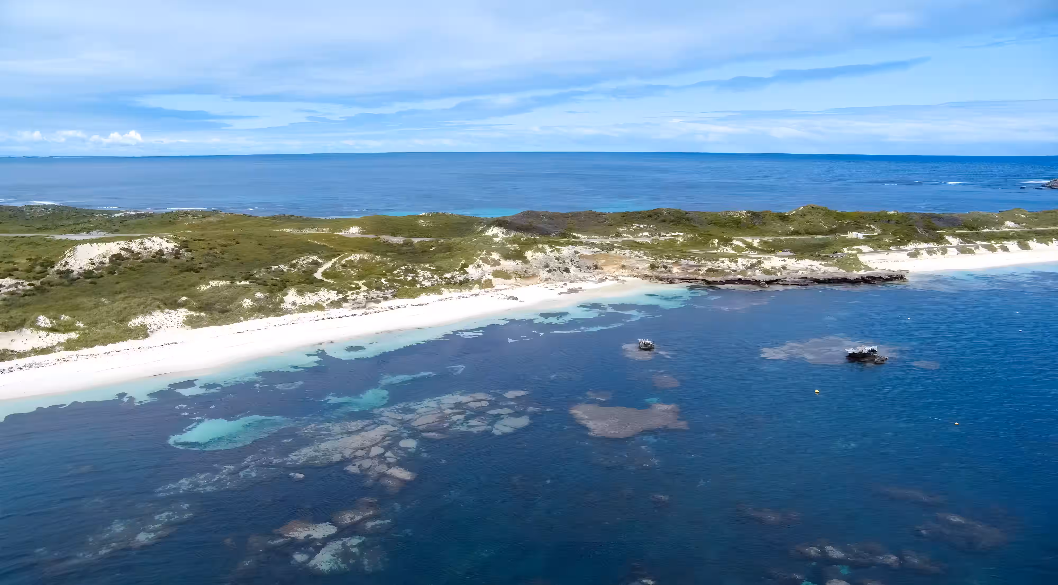 Overhead view of coastal reef formations and beach at Rottnest Island