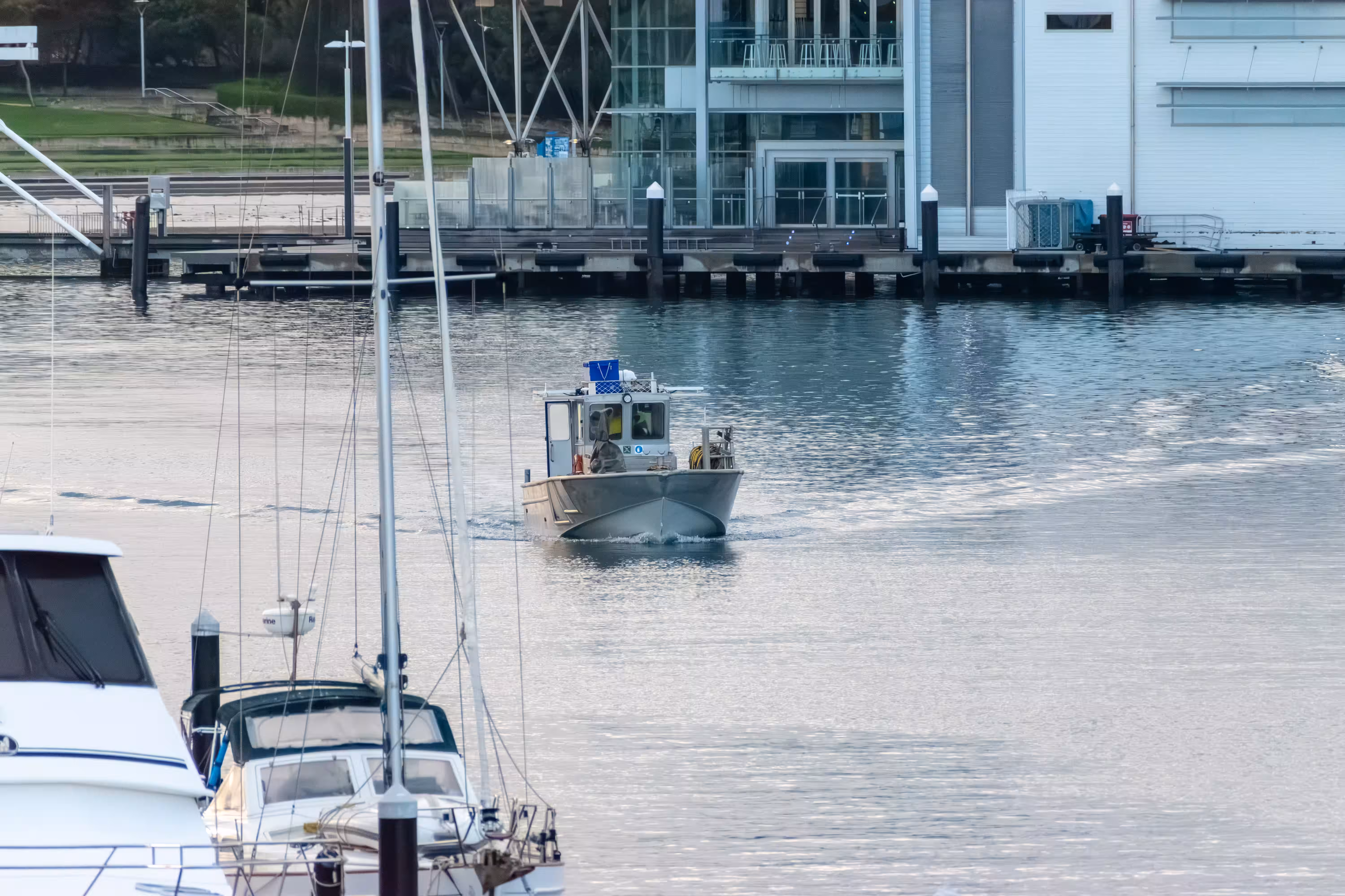 Workboat in marina waters at Hillarys Boat Harbour