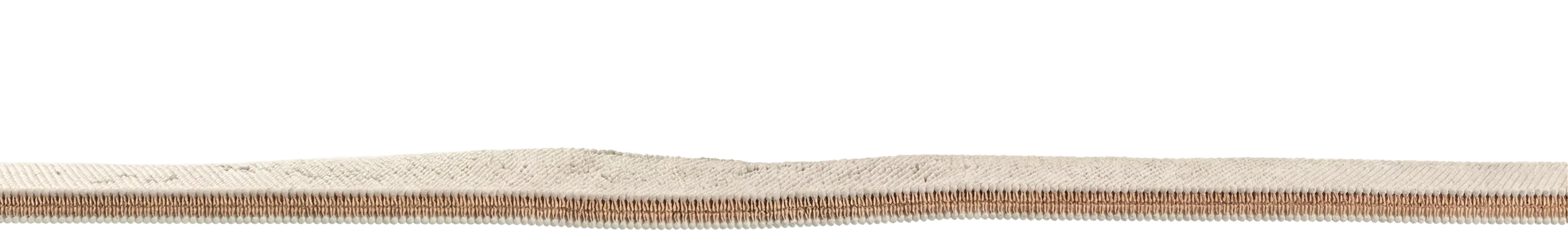 Close-up of a beige layered mattress showing detailed woven texture and foam padding.