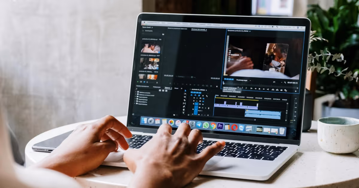 Student editing a video on a computer