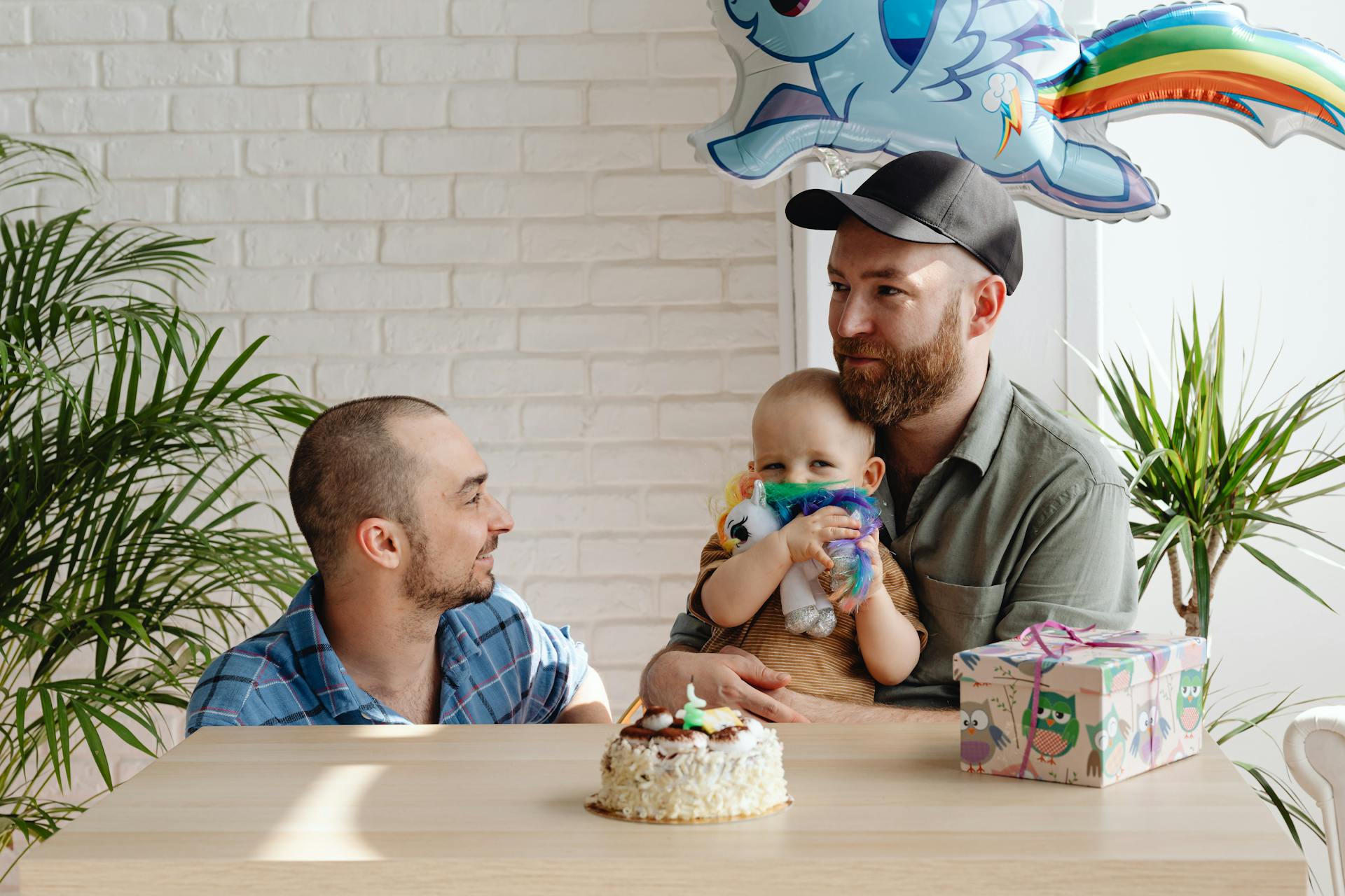 One Year Old Baby with Gift And Cake