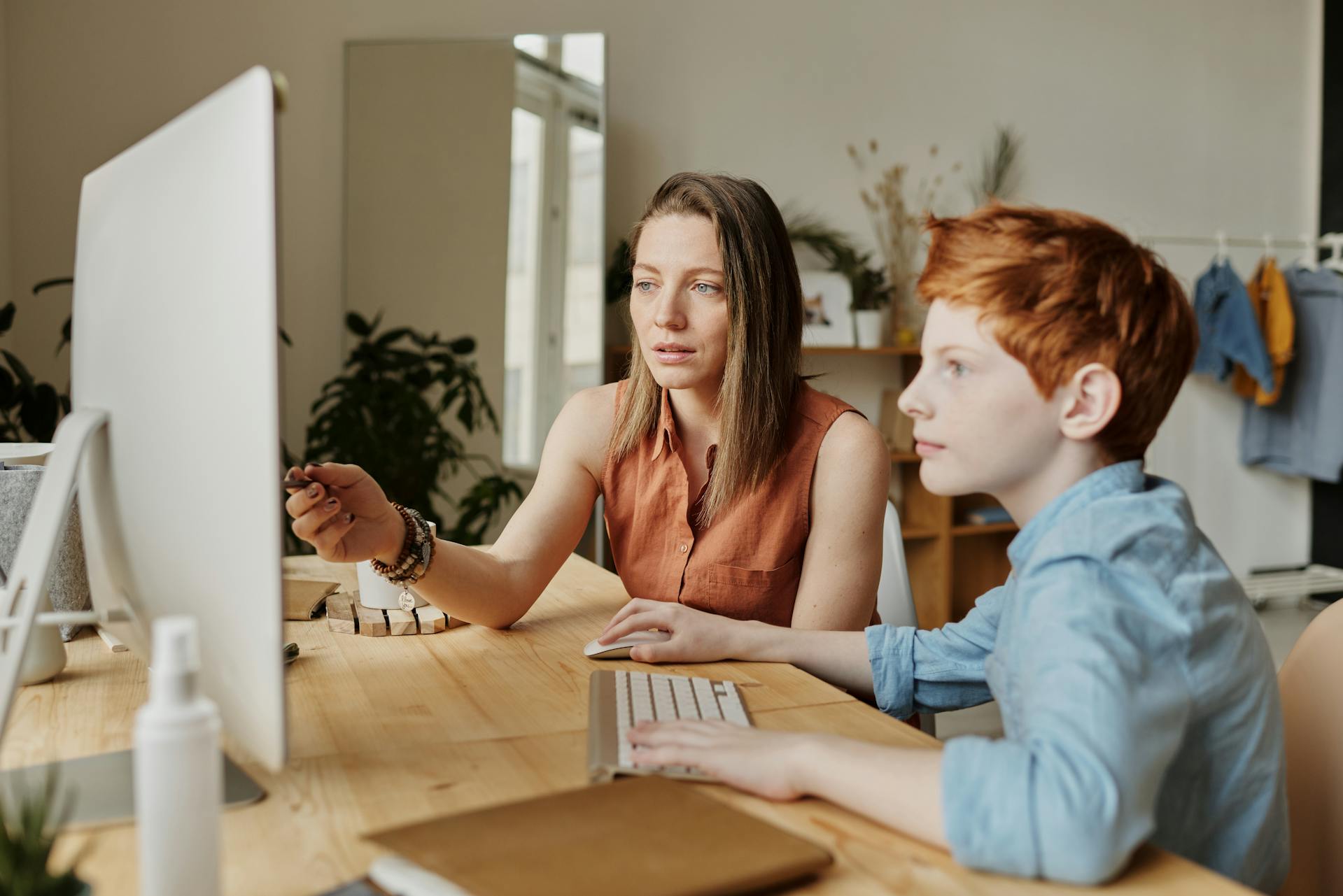 Personal teacher in front of the computer