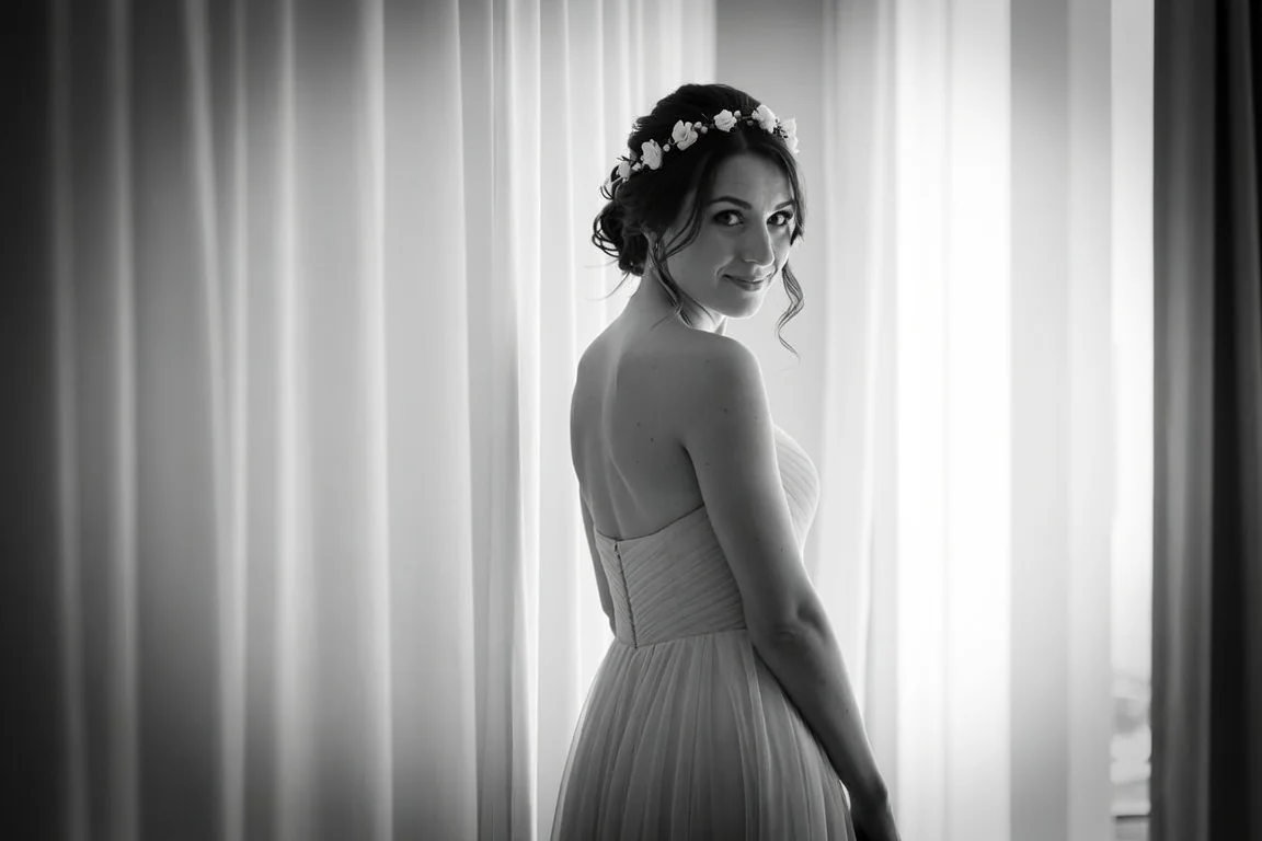 Bride in flower crown looking over her shoulder, representing a heartfelt maid of honor gift moment