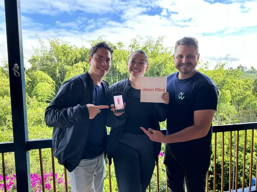 Team members celebrating a development milestone