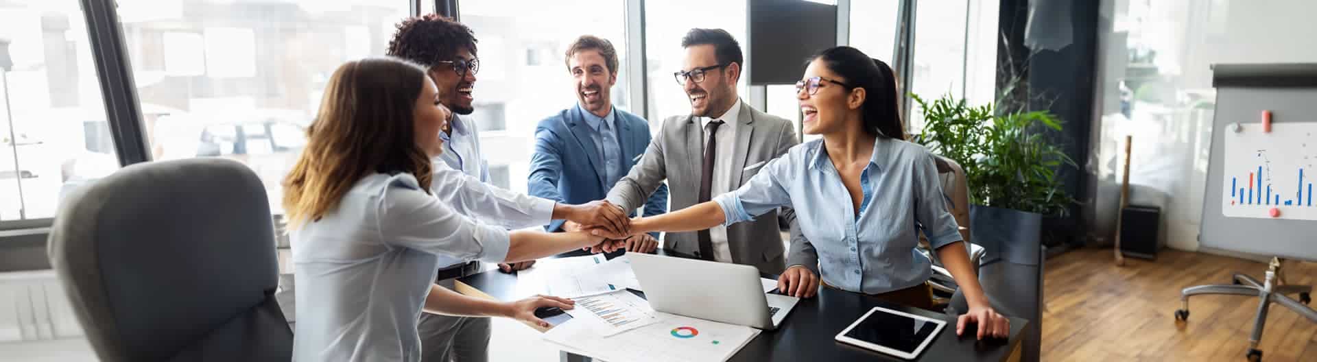 employees smiling - How To Dissolve An LLC In Louisiana 