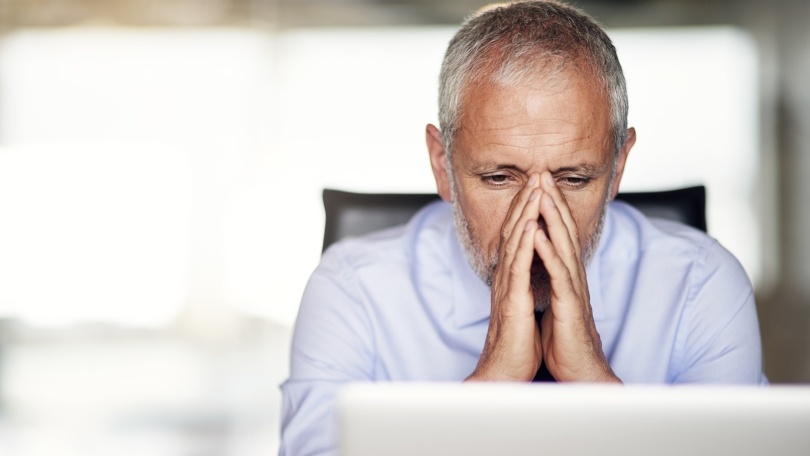 man looking upset - How To Dissolve An LLC In Maryland