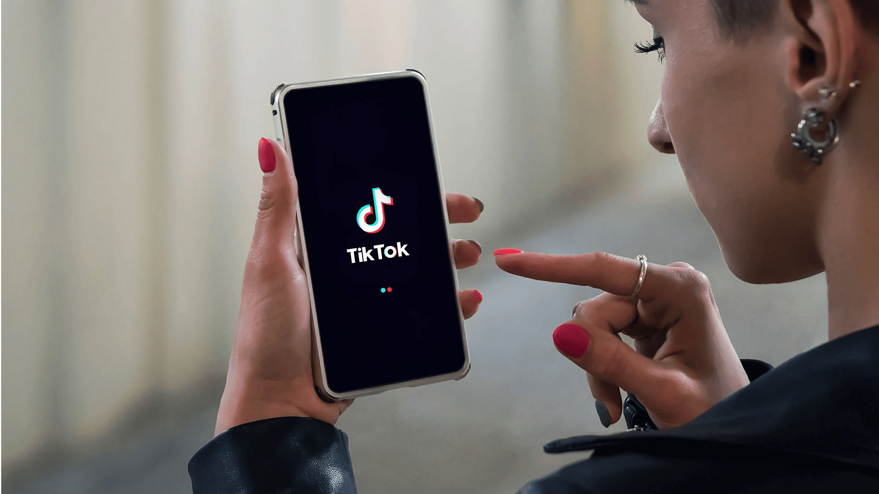 woman using tiktok - How to Add AI Voice to TikTok Videos