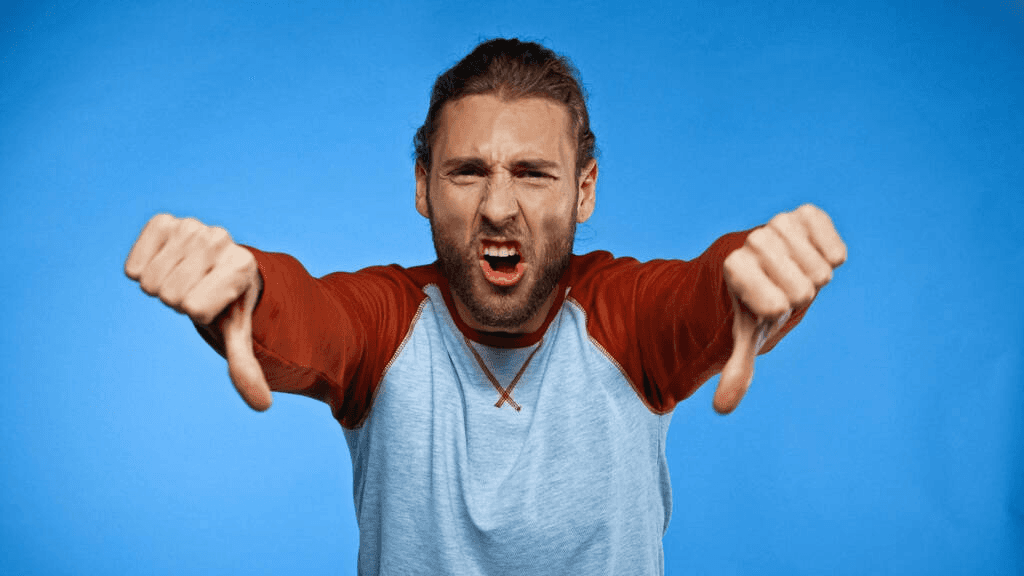 man doing thumbs down - How to Start YouTube Automation